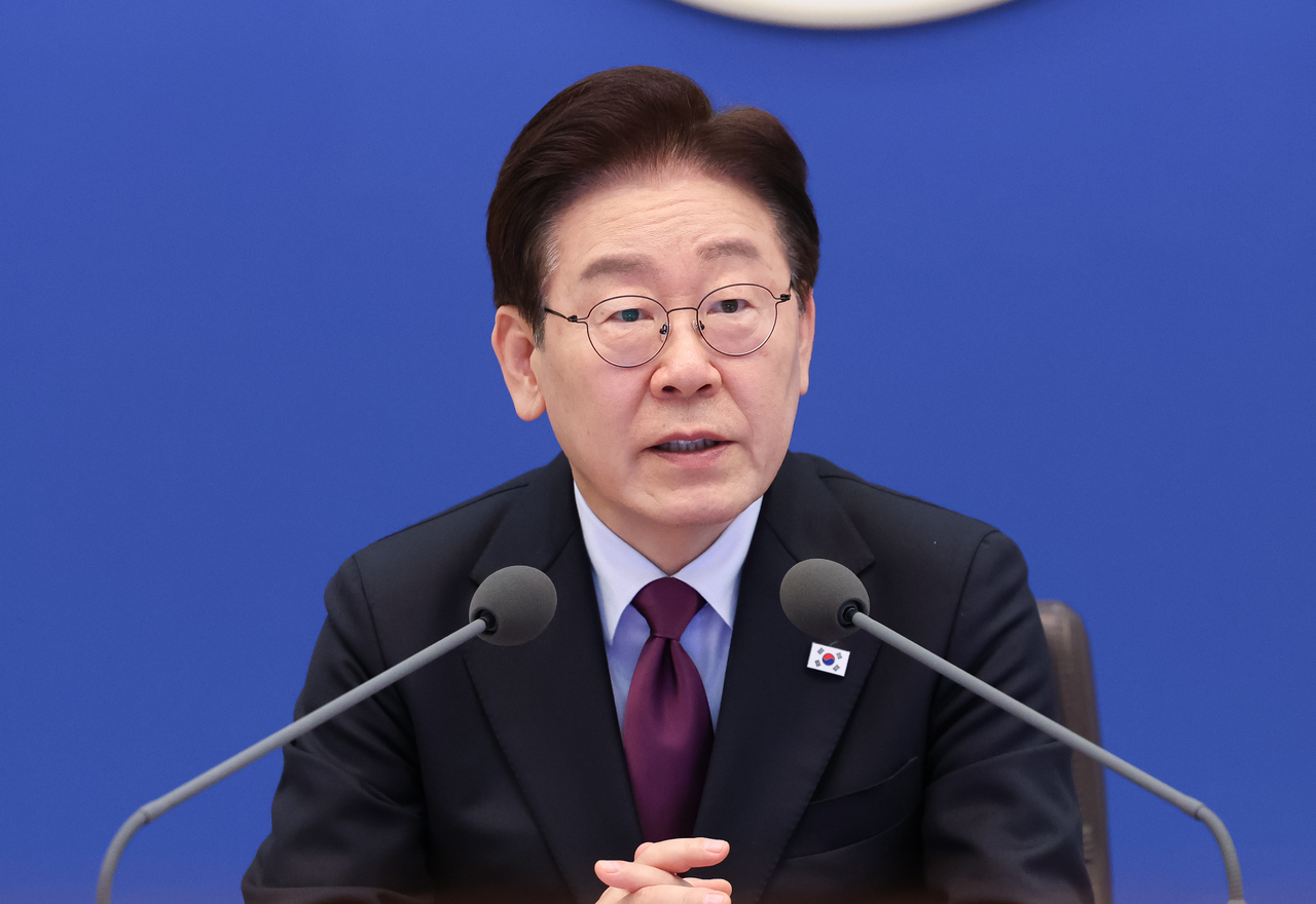 President Lee Jae Myung speaks in a meeting with senior aides on Thursday. Yonhap