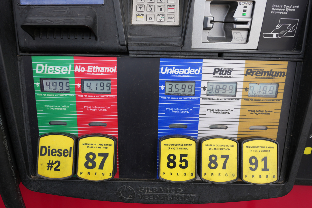 The prices for the grades of gasoline available are electronically displayed on the pump at a QuikTrip gasoline station in Greenwood Village, Colorado, Sunday.   AP-Yonhap