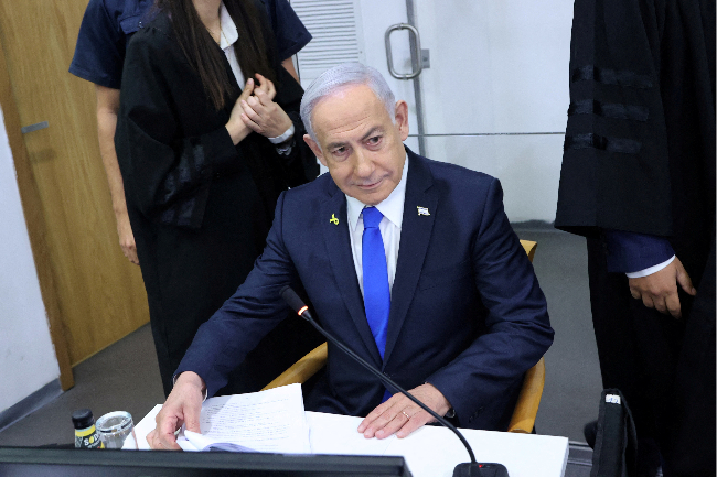 Israeli Prime Minister Benjamin Netanyahu attends his trial on corruption charges at the district court in Tel Aviv, Israel, in April 2025.  (Reuters-Yonhap)