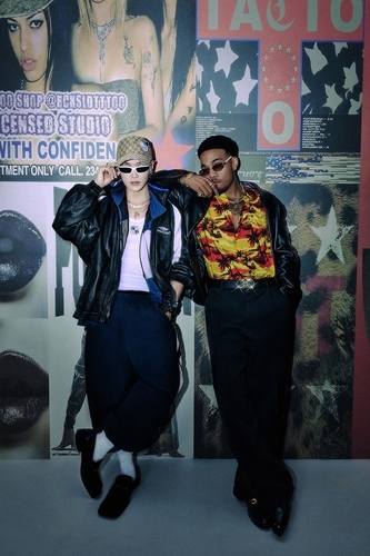 K-pop boy group NCT's Taeyong (L) and American pop star Anderson .Paak are seen in this photo. (SM Entertainment)