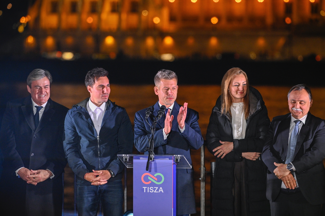 Hungary's chairman of the opposition Tisza Party Peter Magyar (center) addresses supporters after his party won landslide victory in the general elections in Budapest, Hungary, Sunday. (EPA-Yonhap)