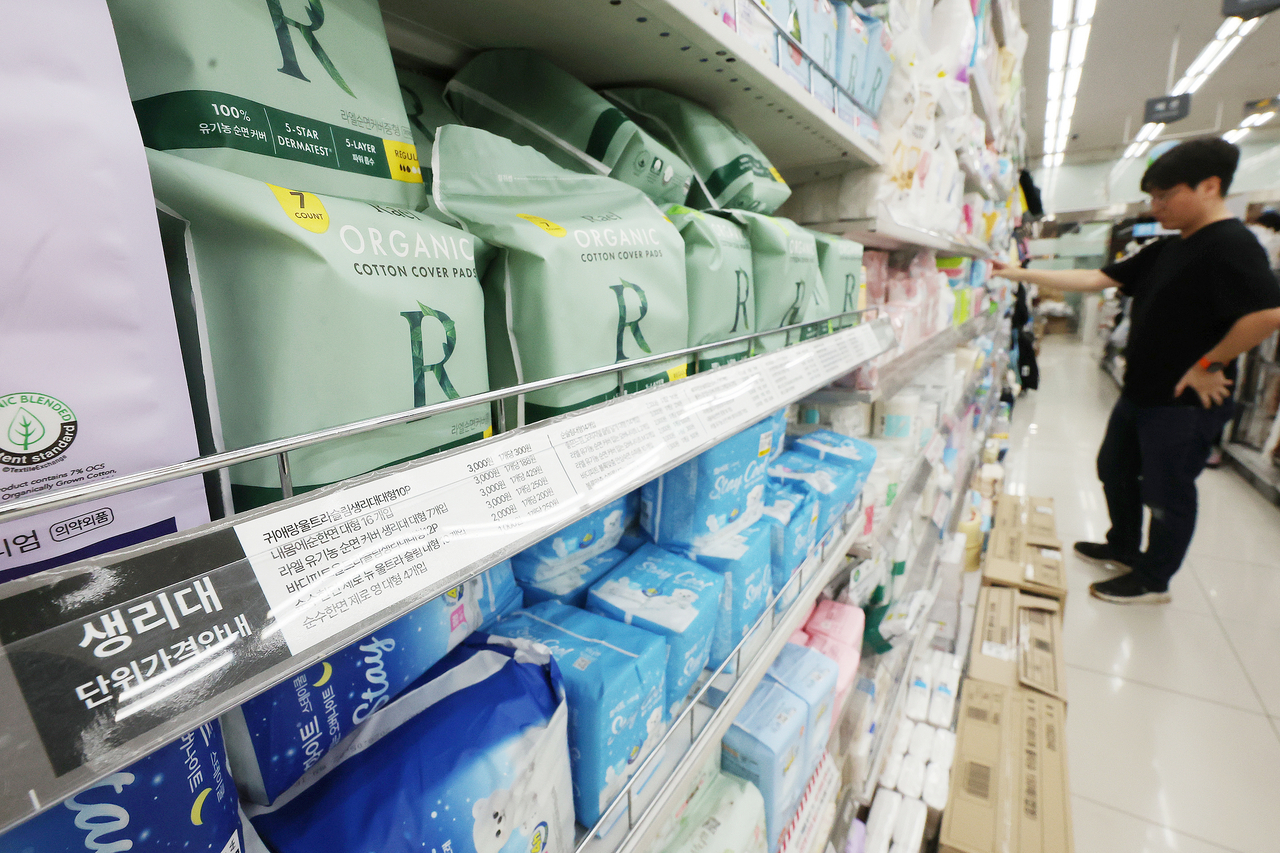 A consumer views products at a Daiso store in Seoul on April 6. (Yonhap)