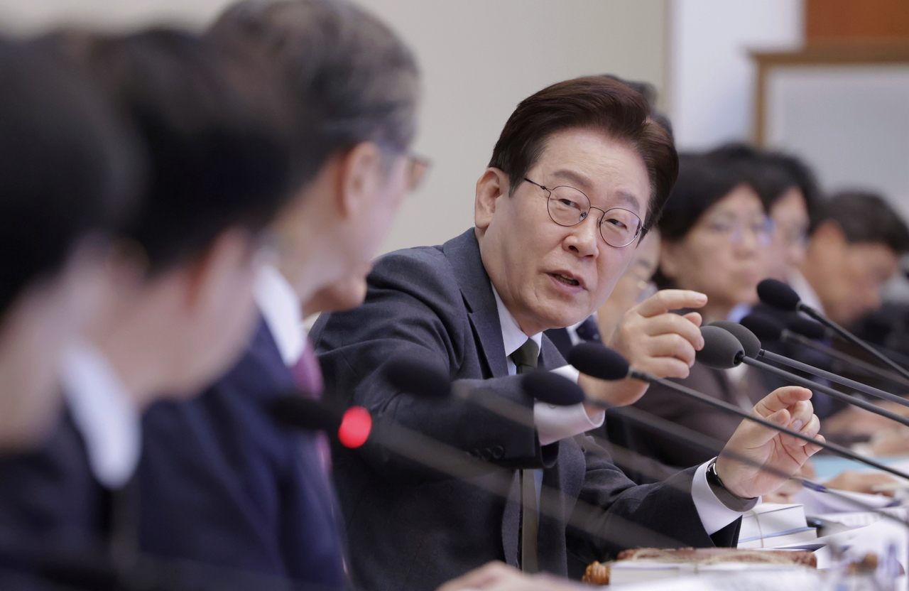 President Lee Jae Myung speaks during a Cabinet meeting combined with an emergency economic review meeting at Cheong Wa Dae in Seoul on Tuesday. (Yonhap)