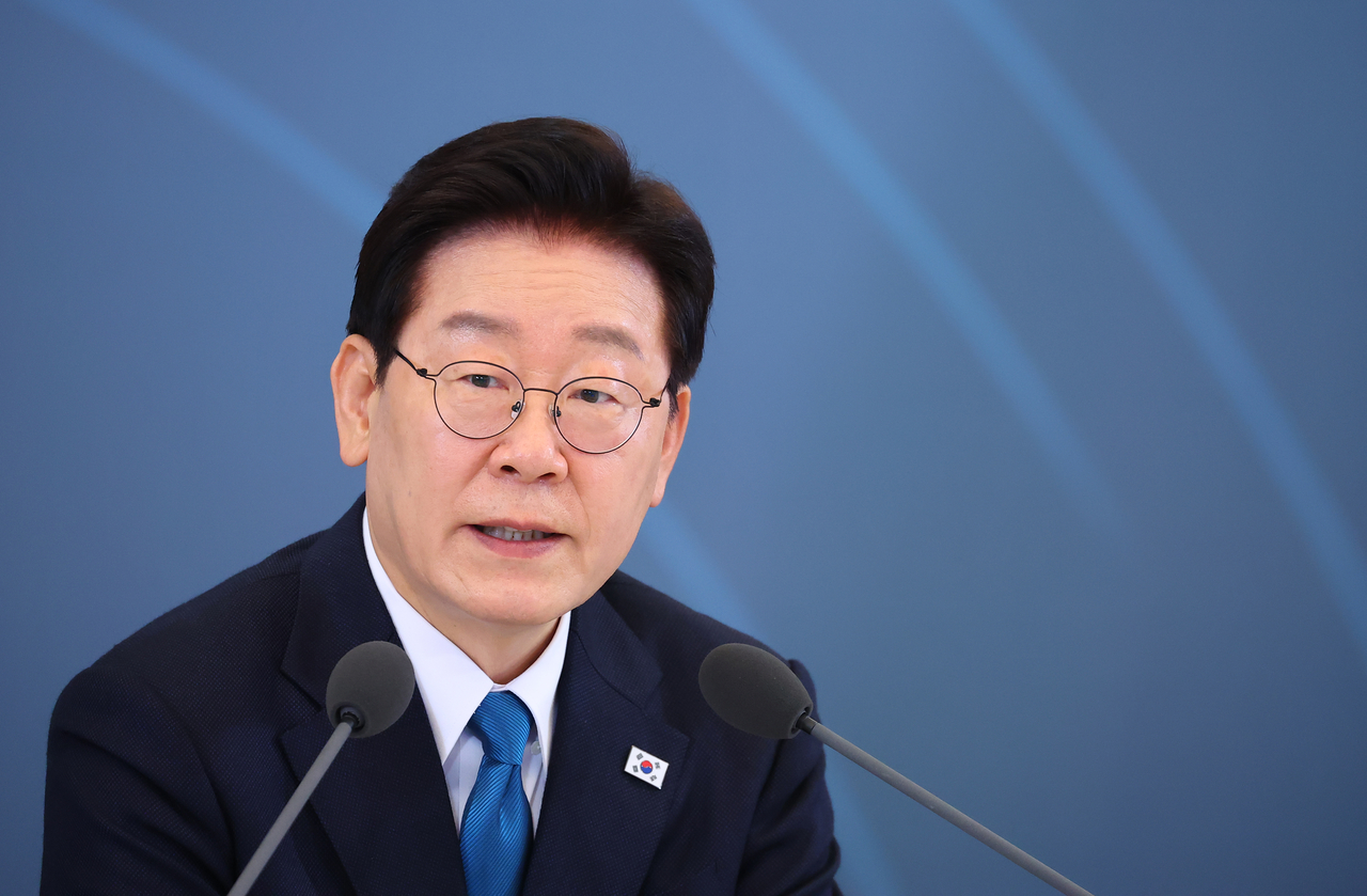 President Lee Jae Myung speaks during a meeting on rationalizing regulations held at Cheong Wa Dae in Seoul on Wednesday. (Yonhap)