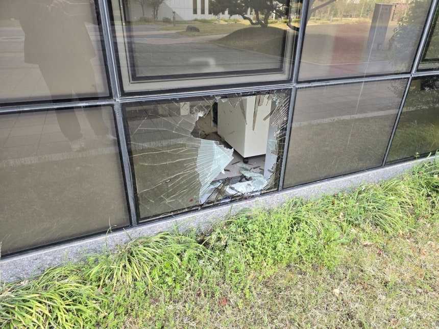 This photo distributed by the Sejong city government shows a glass window believed to have been broken by wild boars on Wednesday. (Sejong city via Yonhap)