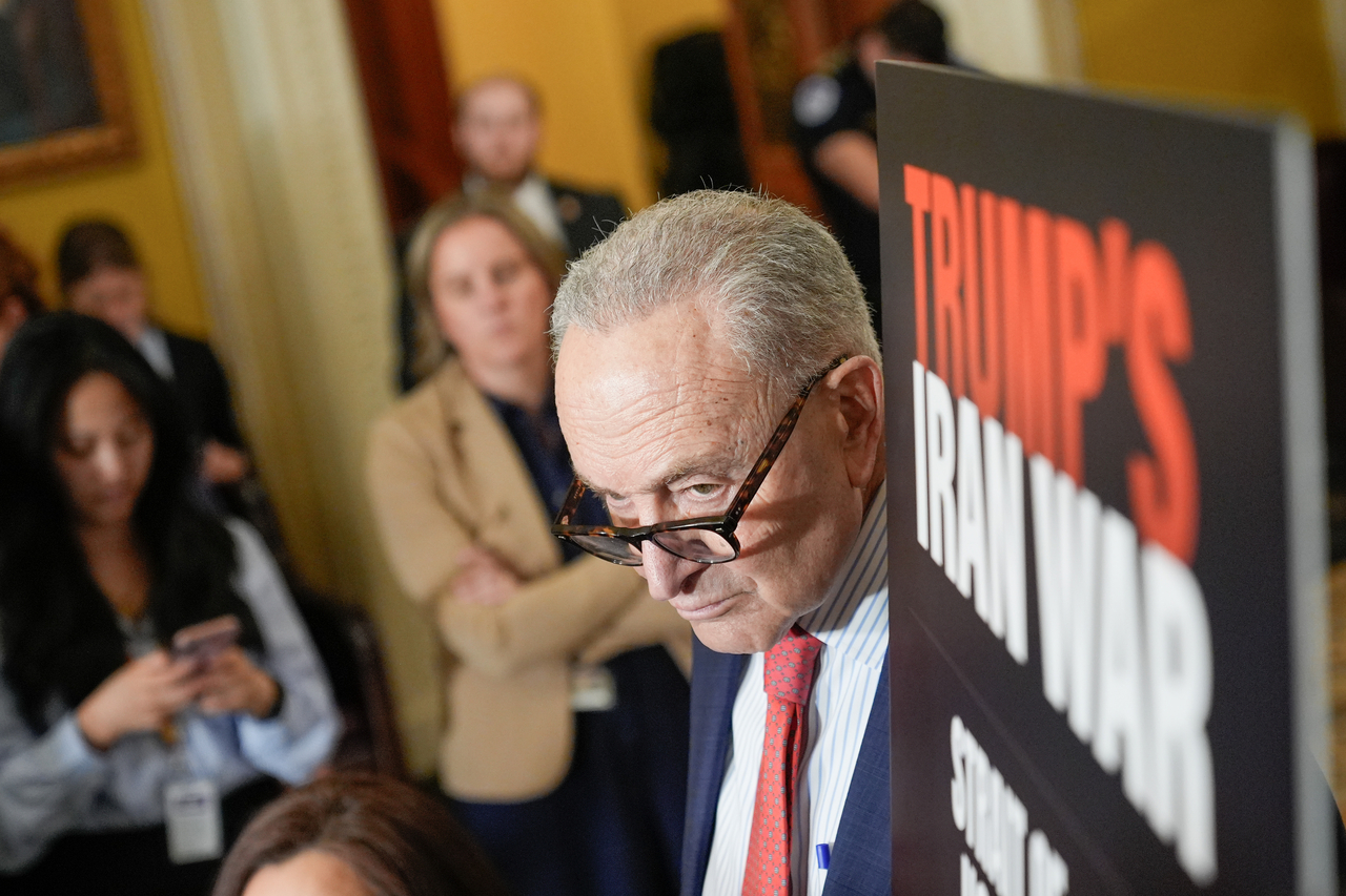 US Senate Minority Leader Chuck Schumer listens during a news conference in Washington, Wednesday. (AP-Yonhap)