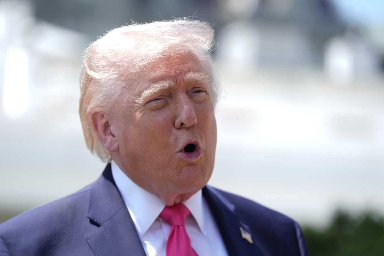 US President Donald Trump speaks to the press on the South Lawn of the White House in Washington on Thursday. (AP-Yonhap)