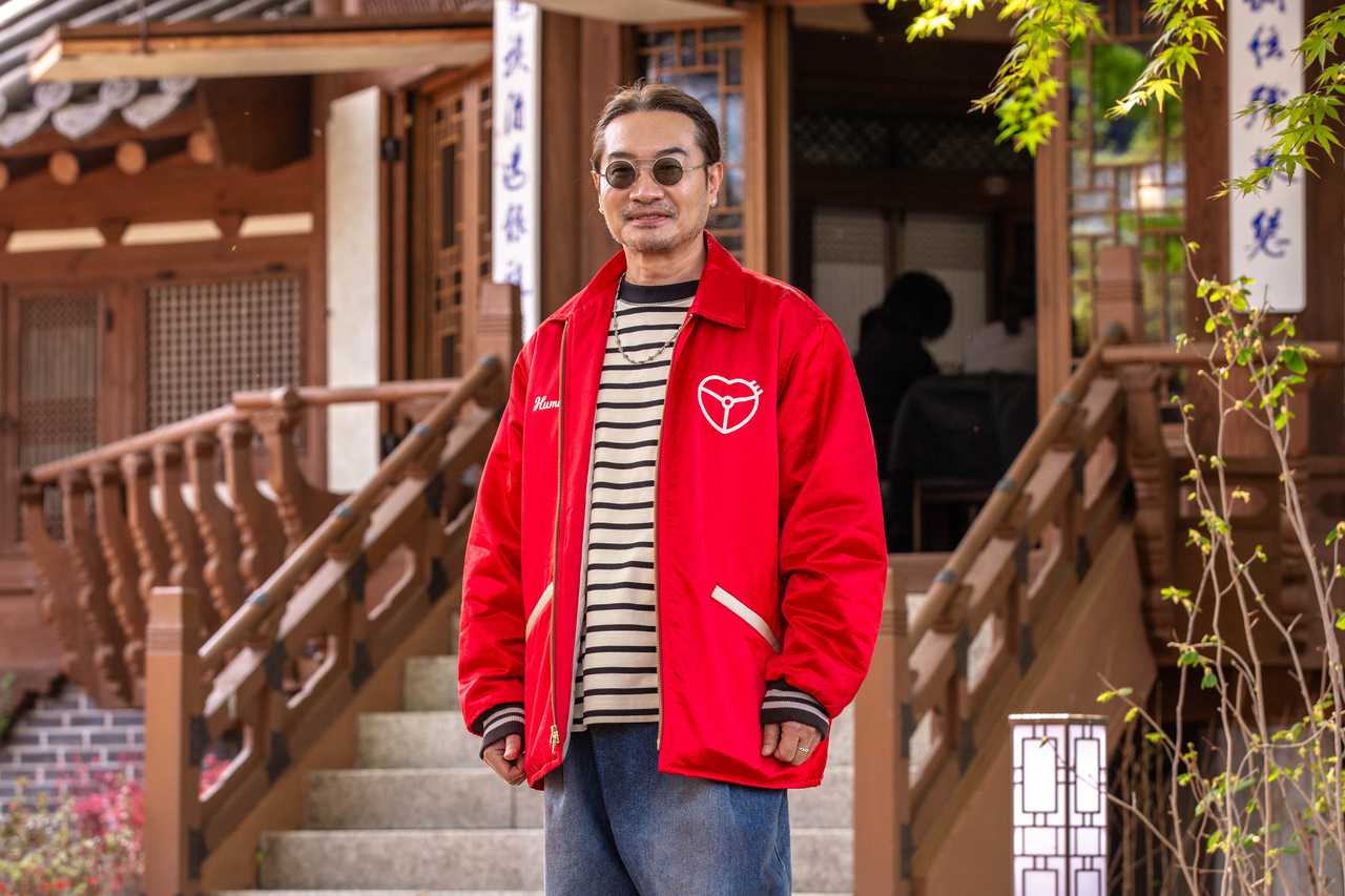 Yang Jeong-woong, artistic director of the 2026 Royal Culture Festival opening ceremony, poses for photos during a group interview on Wednesday. (Korea Heritage Agency)