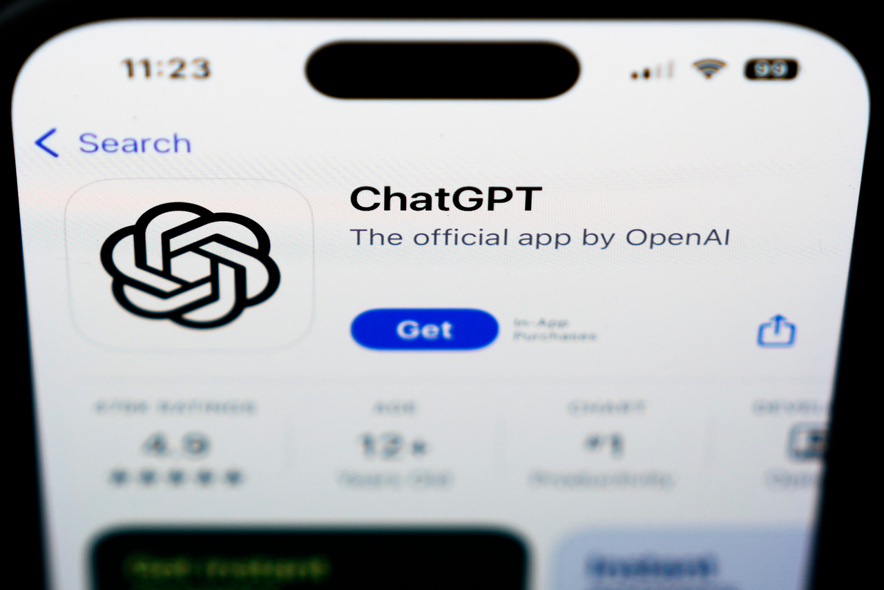 A ChapGPT logo is displayed on a smartphone. (AP-Yonhap)