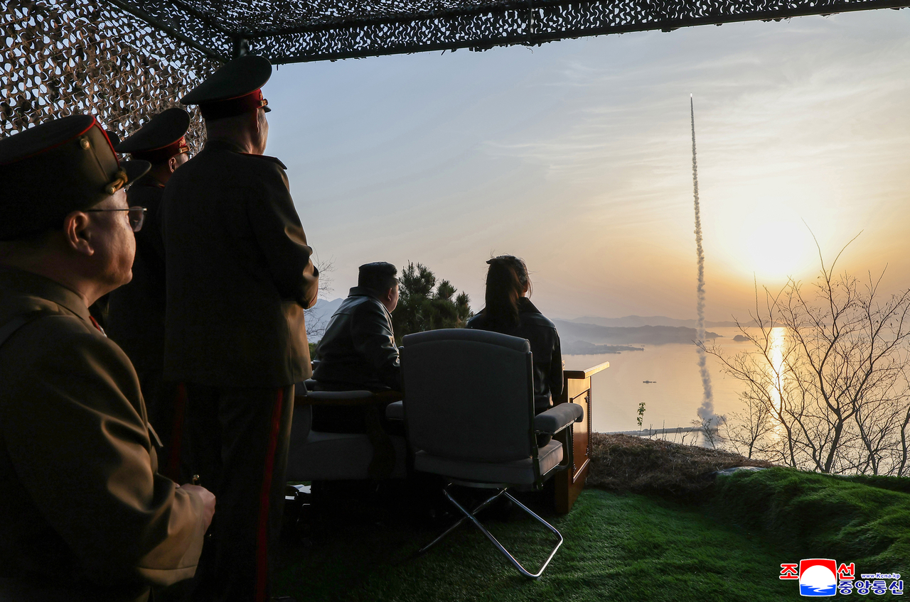 North Korean leader Kim Jong-un observes test launches of upgraded short-range ballistic missiles in this photo released on April 20, 2026, by North Korea's official Korean Central News Agency. (Yonhap)