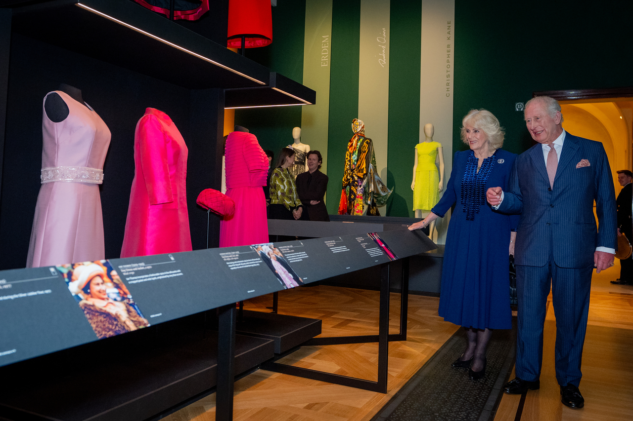 Britain's King Charles III (right) and Queen Camilla during a visit to the Queen Elizabeth II: Her Life in Style exhibition at The King's Gallery, at Buckingham Palace in London, Monday.   AP-Yonhap
