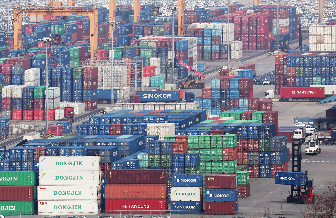 Containers are stacked at a port in the city of Pyeongtaek, south of Seoul, in this file photo from April 1, 2026. (Yonhap)