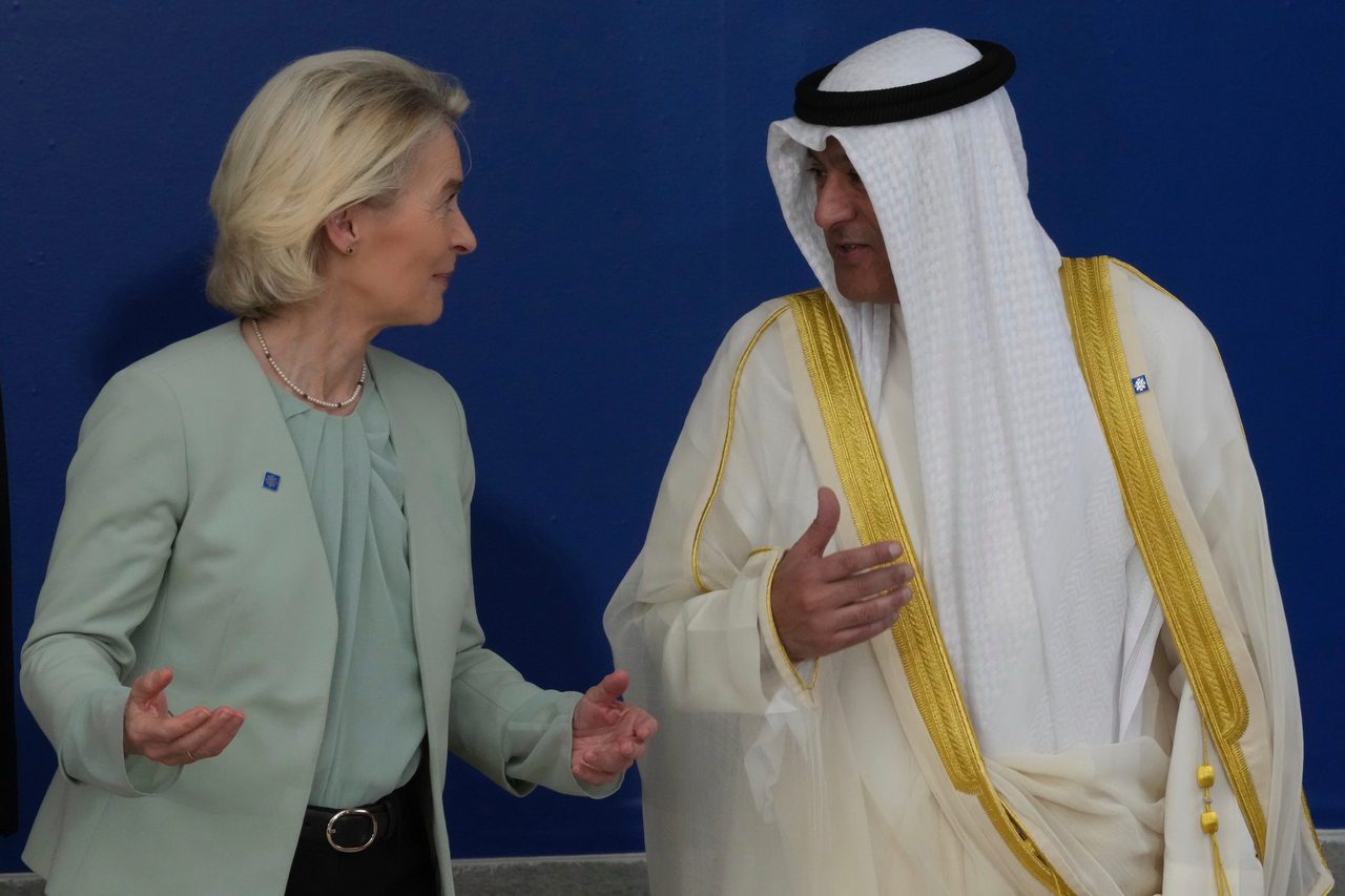 European Commission President Ursula von der Leyen (left) speaks with the Gulf Cooperation Council Secretary General Jasem Mohamed Albudaiwi before a family photo of the EU Summit in Nicosia, Cyprus, Friday.   AP-Yonhap
