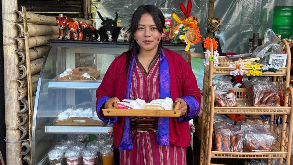 Phurpa Dema, owner of Phurpa’s Bliss Bite bakery, poses for pictures in the town of Merak, Trashigang, Bhutan.   (Kuensel)