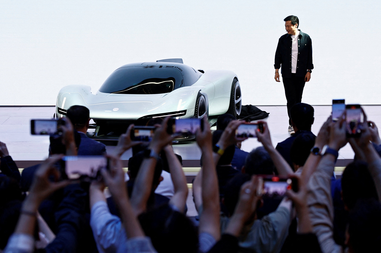 Xiaomi Founder and CEO Lei Jun unveils the Xiaomi Vision Gran Turismo concept car at Auto China in Beijing on Friday. (Reuters-)