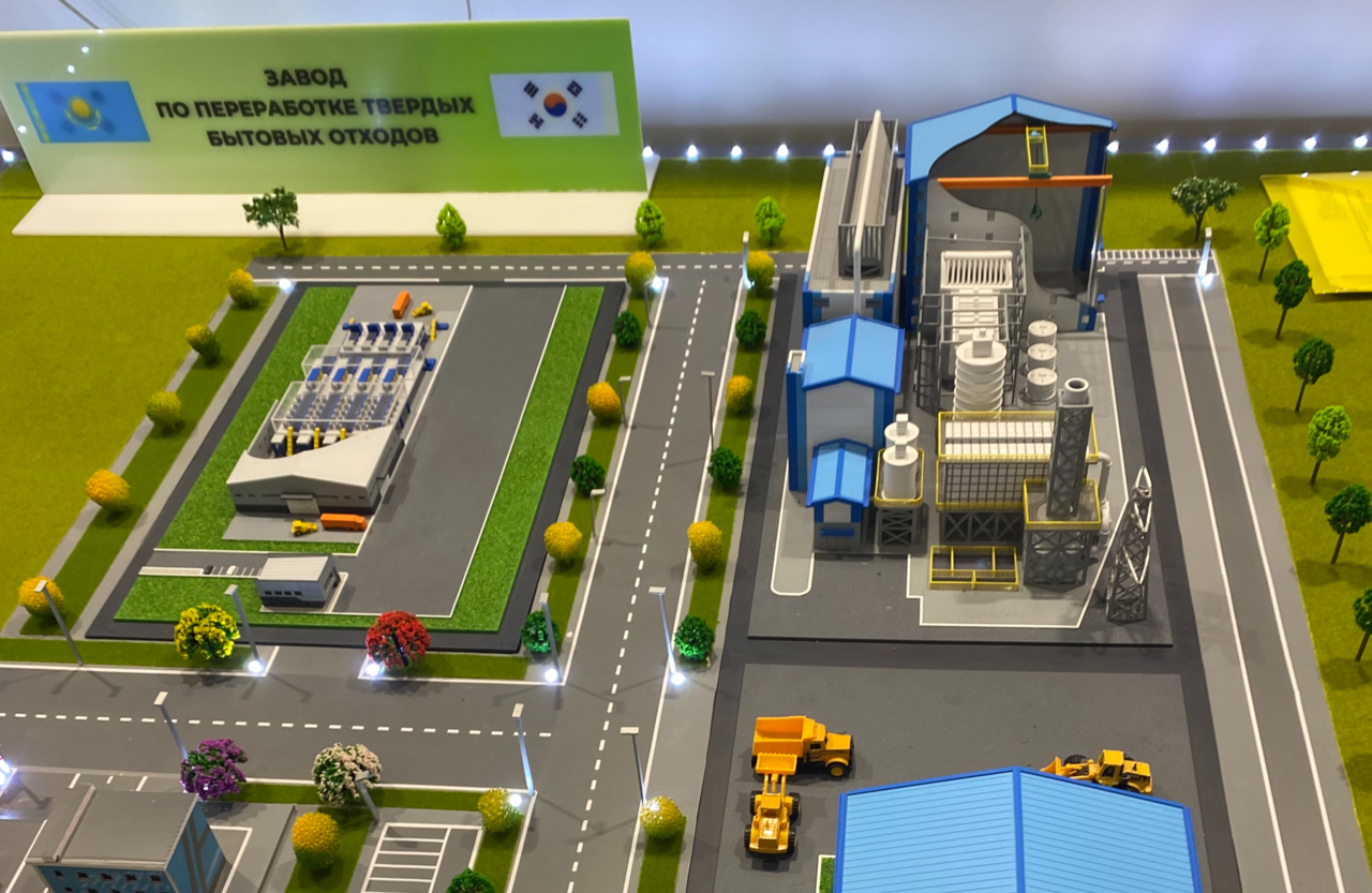 Prototype of the “With You Kyzylorda” complex, a waste separation project in the Kyzylorda region, is displayed at the region’s booth at the Regional Ecological Summit Expo 2026 in Astana, Kazakhstan, Friday. (Lim Jae-seong/The Korea Herald)