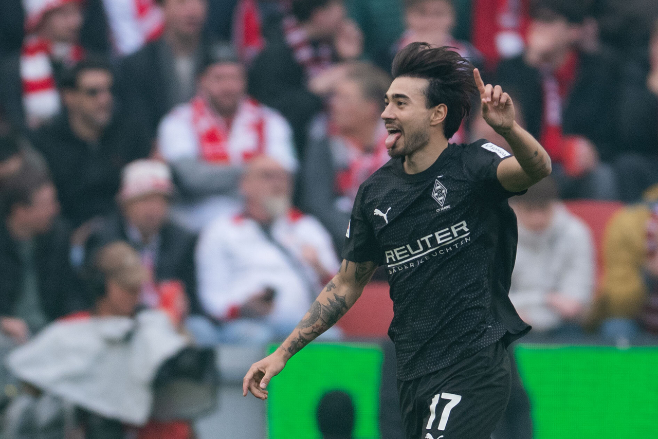 Jens Castrop of Borussia Monchengladbach celebrates after scoring a goal against 1. FC Koln during the clubs' Bundesliga match at RheinEnergieStadion in Koln, Germany, on March 21. (AP-Yonhap)