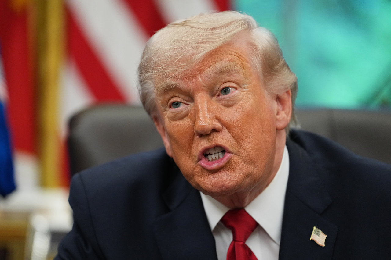 US President Donald Trump speaks to reporters in the Oval Office of the White House in Washington on Wednesday. (AP-Yonhap)