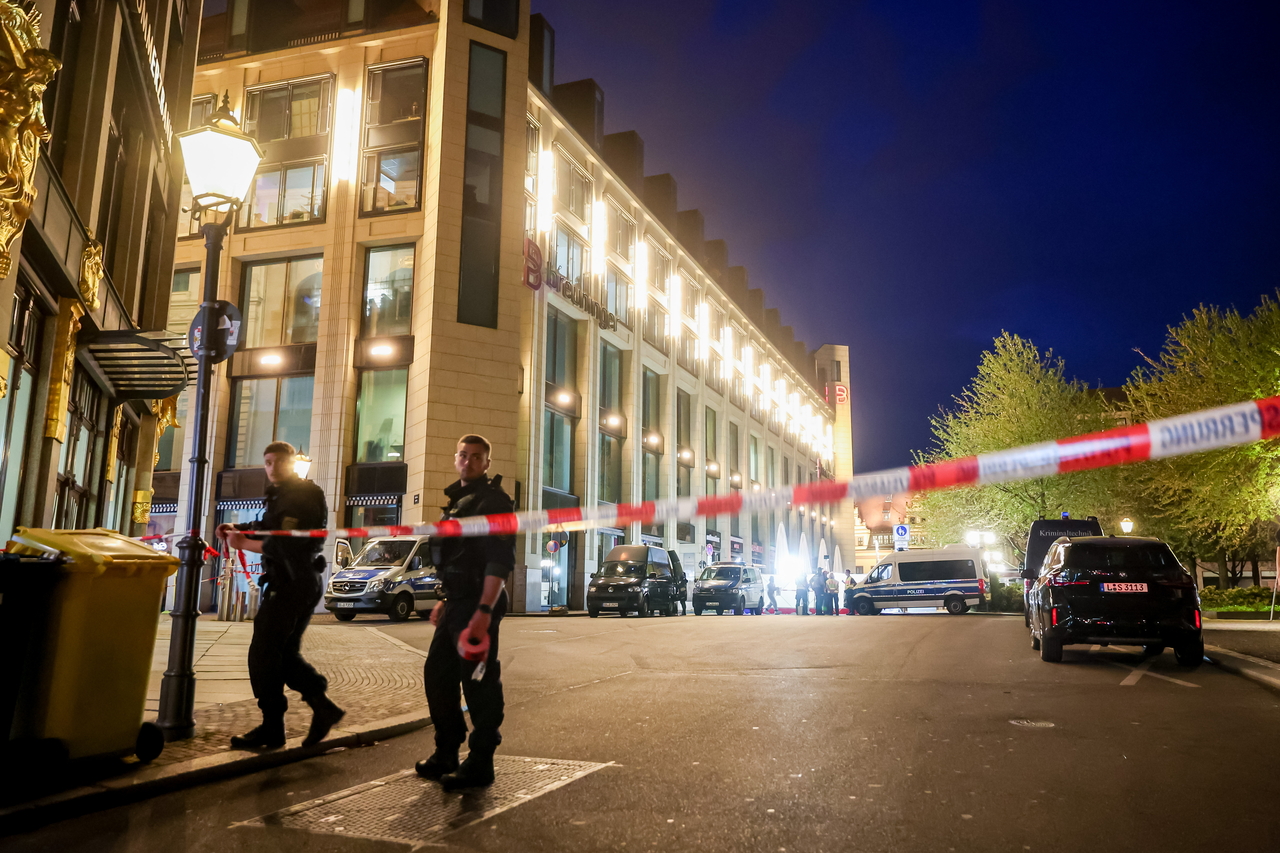 Police officers work at the scene after at least two people were killed and several others injured when a car drove into a crowd in a pedestrian zone in Leipzig, Germany, Monday. (EPA-Yonhap)
