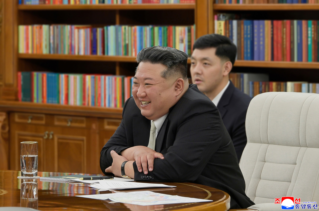 North Korean leader Kim Jong-un is seen talking with Russian Defense Minister Andrey Belousov, who visited North Korea to attend the completion ceremony of the 'Memorial Museum of Combat Feats at Overseas Military Operations,' in this photo released by the Korean Central News Agency on April 27, 2026. (KCNA-Yonhap)