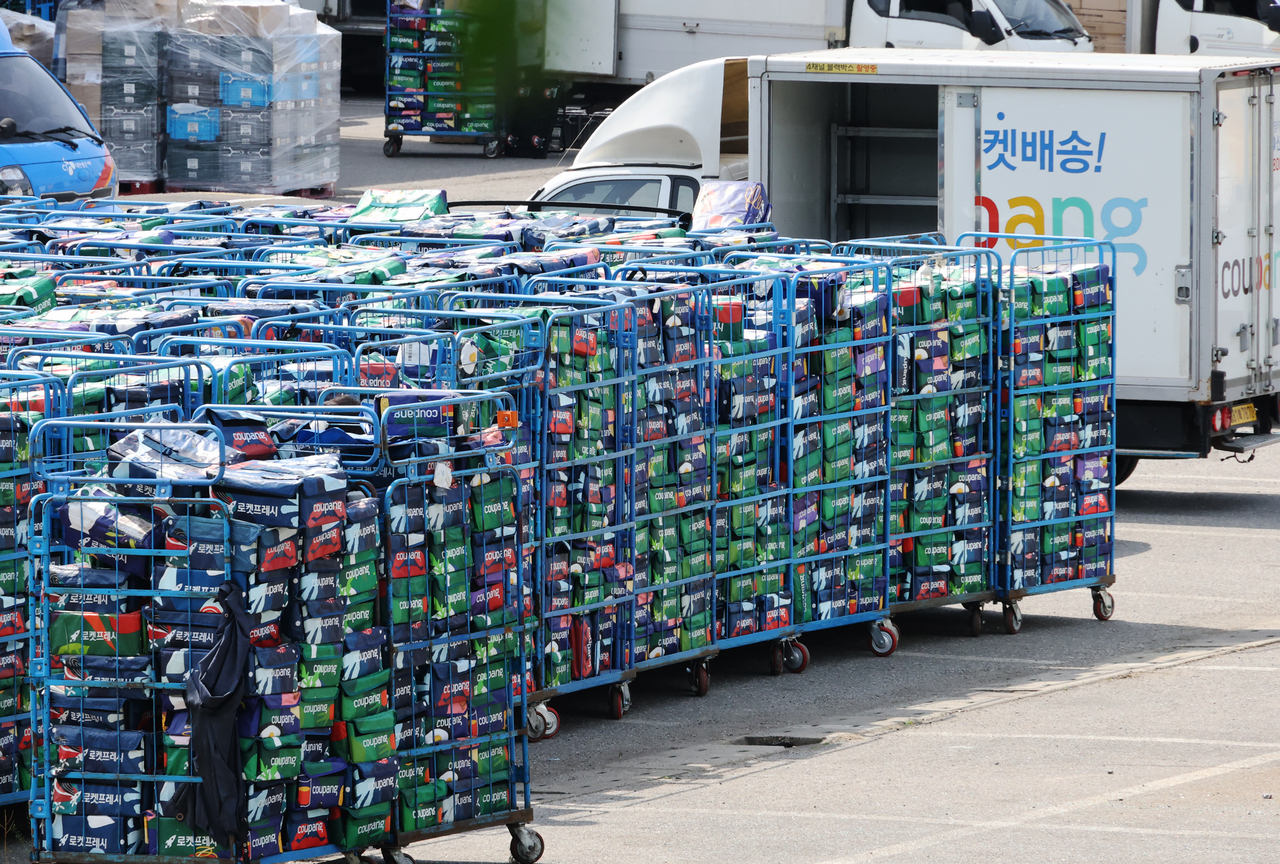 Delivery bags are piled up at Coupang's logistics center in southern Seoul on April 29. (Yonhap)