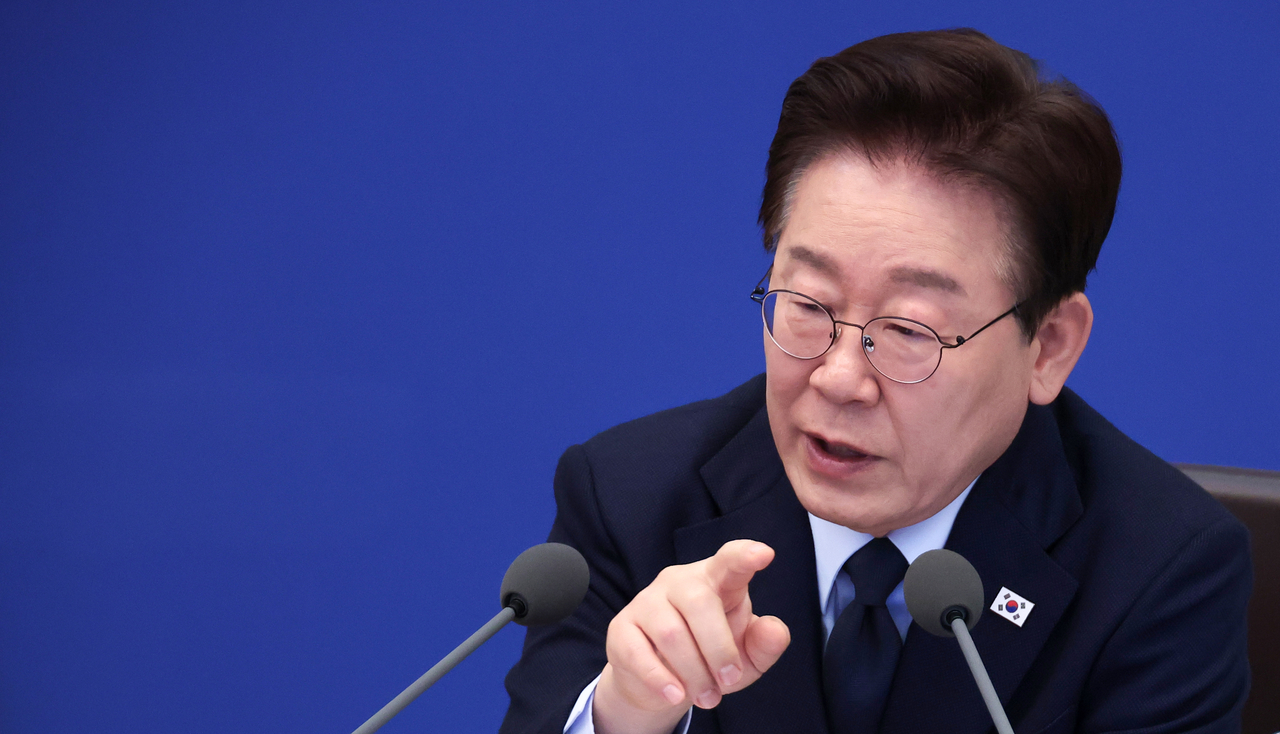 President Lee Jae Myung speaks during a Cabinet meeting and emergency economic review meeting at Cheong Wa Dae in Seoul on Wednesday. (Yonhap)