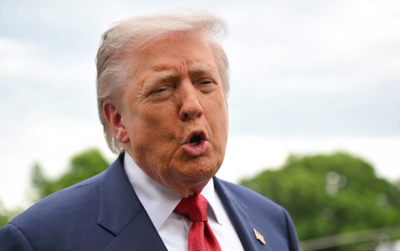 US President Donald Trump speaks to journalists at the South Lawn of the White House in Washington on May 8, in this photo released by AFP. (Yonhap)