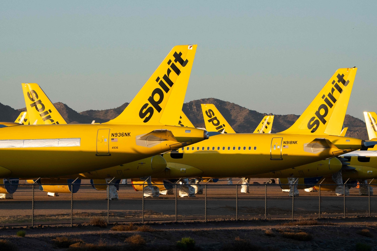 Spirit Airlines planes sit parked at the Phoenix Goodyear Airport in Goodyear, Arizona, on Friday.   AFP-Yonhap