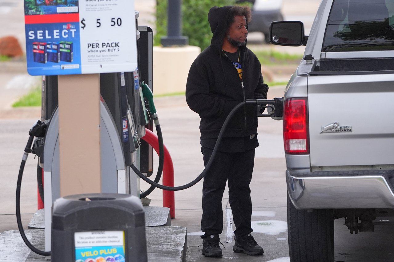 A motorist fills up their truck at a gas station in Dallas on Wednesday.   AP -Yonhap