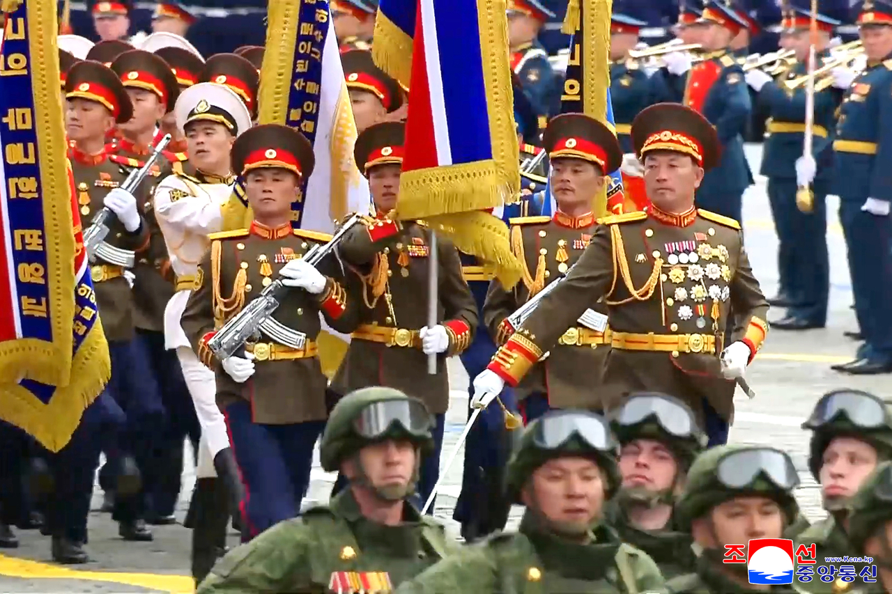 North Korean troops march in a Victory Day military parade in Red Square in Moscow on Saturday. (Korean Central News Agency)