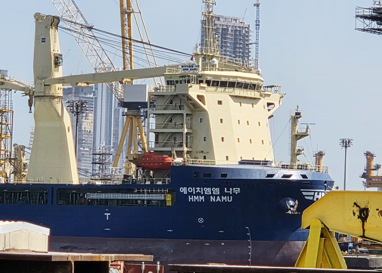 The HMM Namu, a Panama-flagged cargo ship operated by South Korean shipping firm HMM Co., is seen docked at a Dubai port on May 8, 2026. (Yonhap)