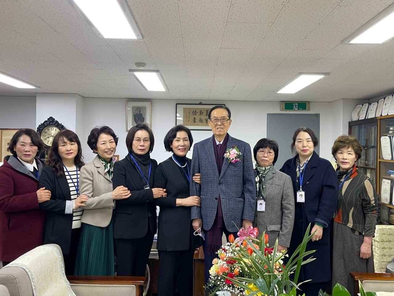 Lee Seon-jae (fourth from right), principal of Ilsung Women's Middle and High School, poses for a photo with students in 2024. (Ilsung Women's Middle and High School)