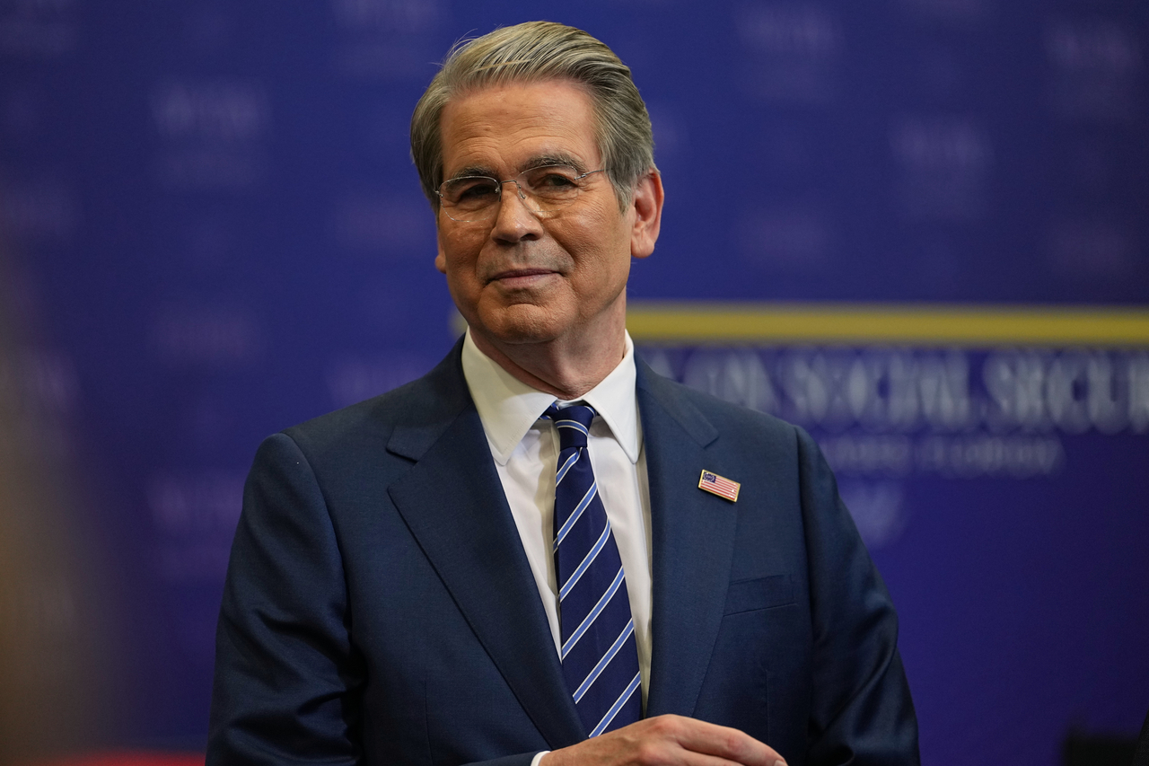 US Treasury Secretary Scott Bessent listens as President Donald Trump speaks at a charter school in Florida, in this AP file photo from May 1, 2026. (Yonhap)