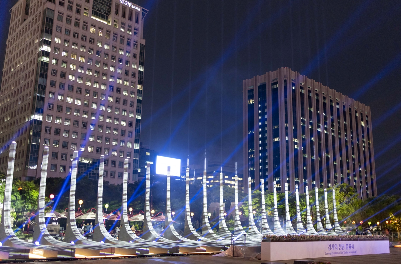 The Garden of Gratitude in Seoul's Gwanghwamun Square is illuminated at night on Monday. (Yonhap)