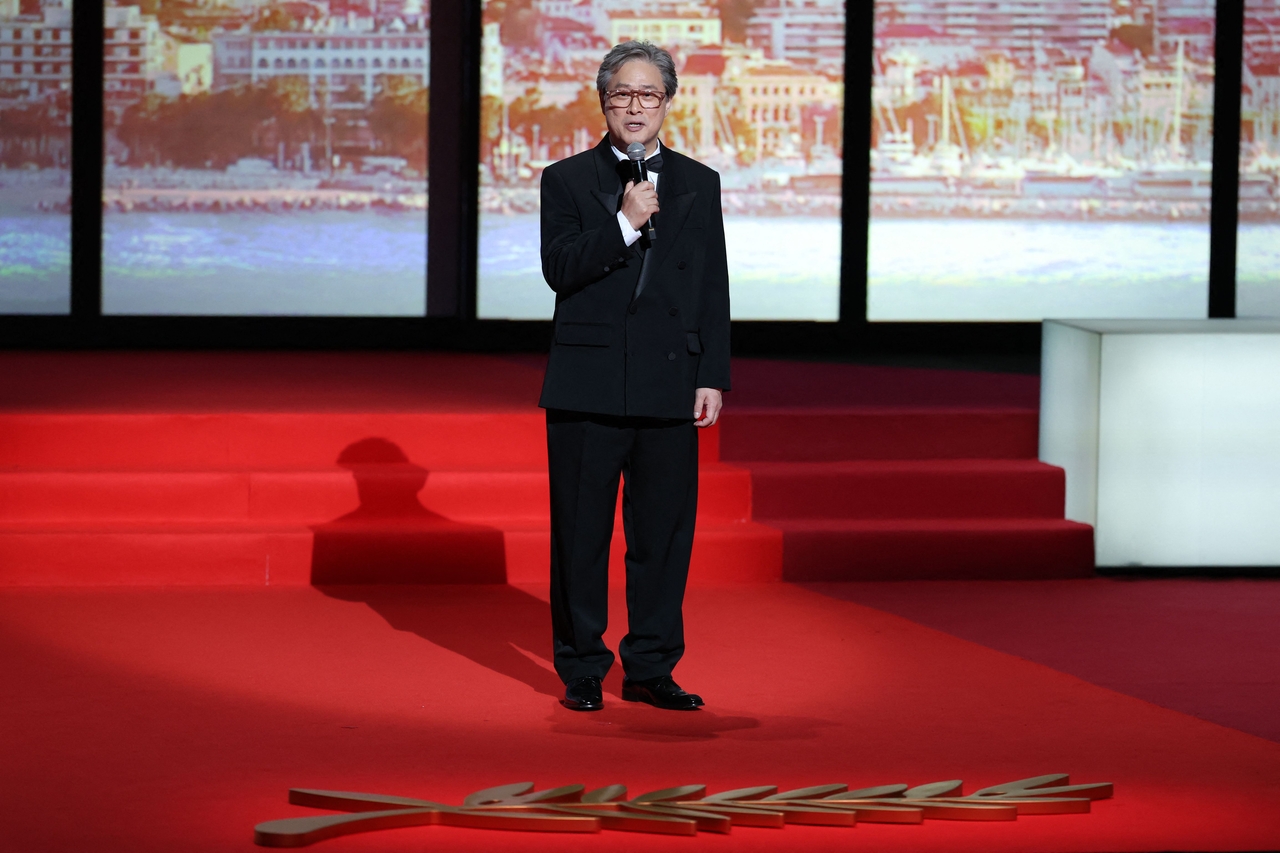 Jury president Park Chan-wook speaks on stage during the opening ceremony of the 79th Cannes Film Festival in France on Tuesday. (AFP-Yonhap)