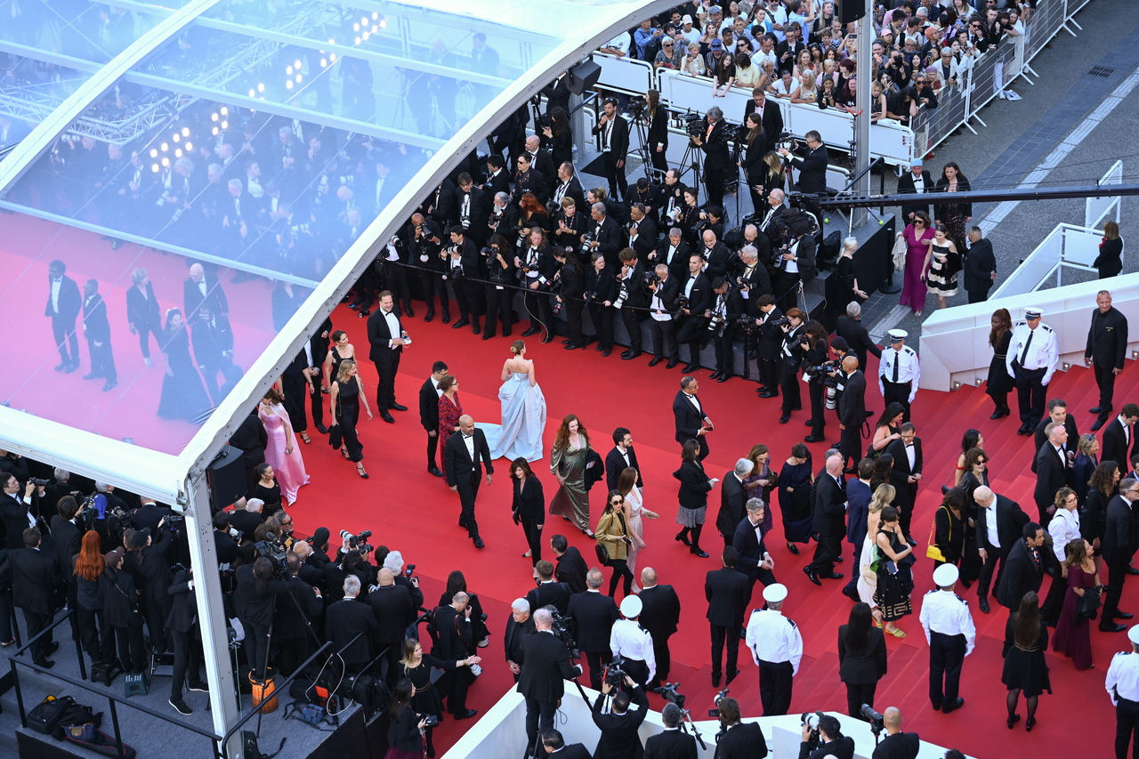Guests arrive on the red carpet for the opening ceremony of the 79th Cannes Film Festival in France on Tuesday. (EPA-Yonhap)