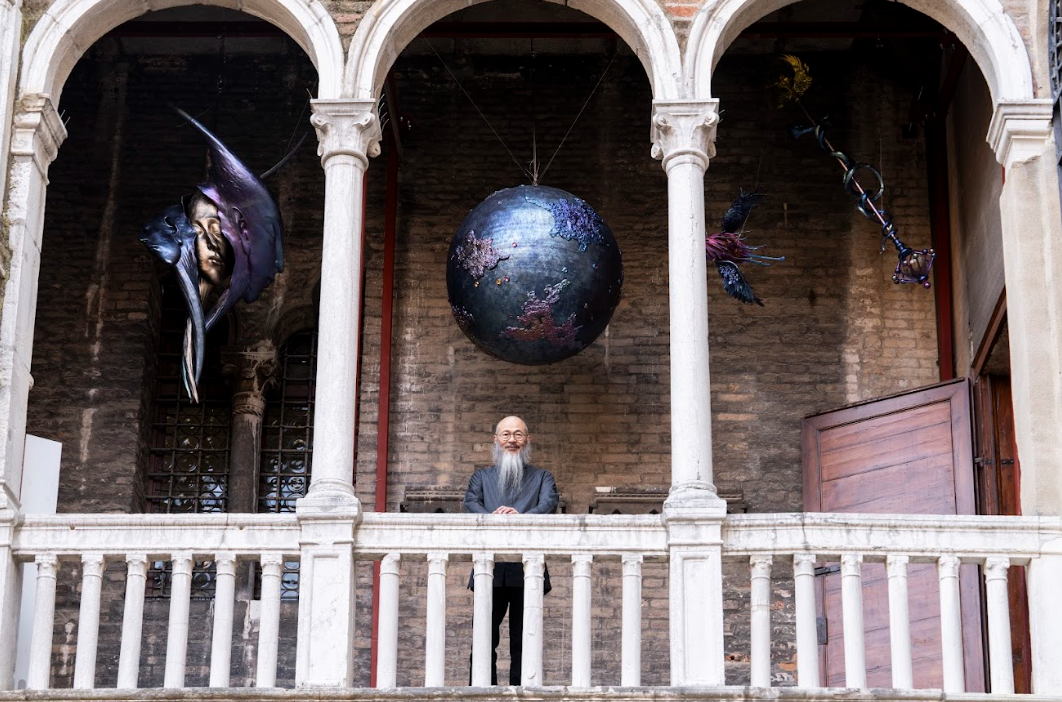 Wallace Chan's Mercury sculptures hang above the artist at Palazzo Contarini del Bovolo in Venice, Italy. (Courtesy of the artist)