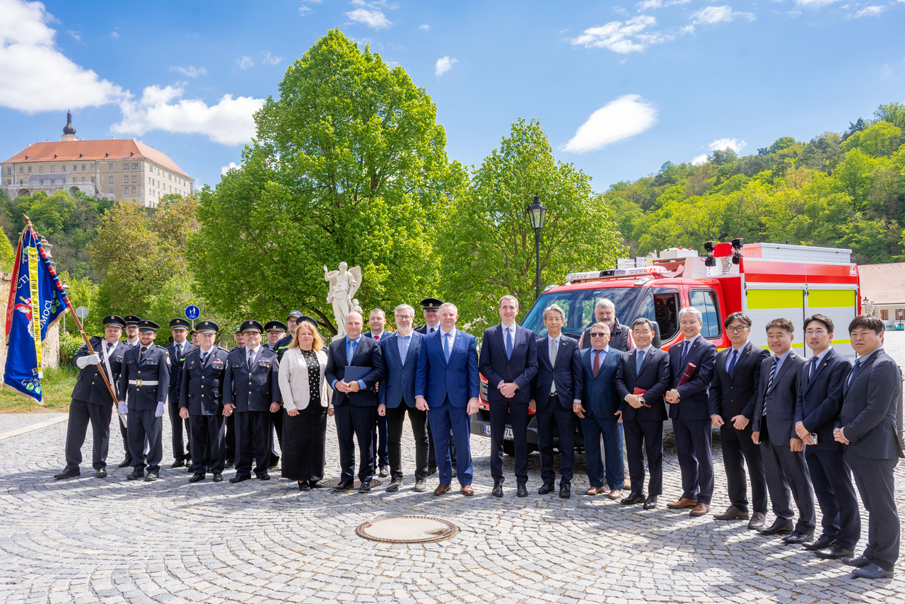 Daewoo E&C CEO Kim Bo-hyun participates in a fire truck donation ceremony near the Dukovany Nuclear Power Plant in the Czech Republic, emphasizing local community engagement.