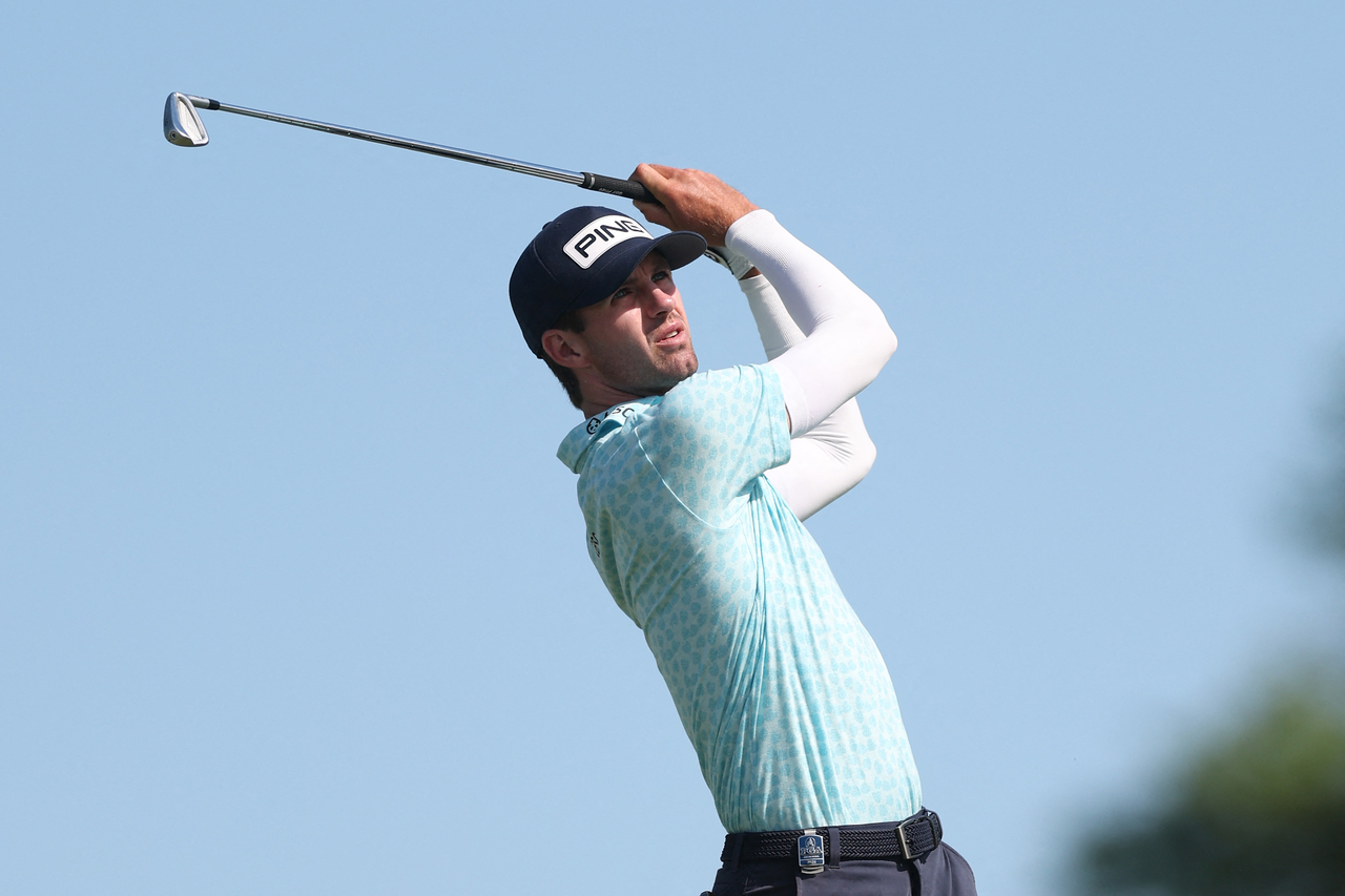 Alex Smalley of the United States hits a tee shot on the eighth hole during the third round of the PGA Championship, in Newtown Square, Pennsylvania, Saturday.   (AFP-Yonhap)