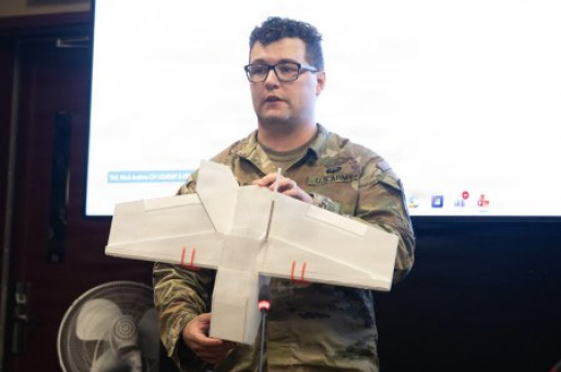 Sgt. Seth Steel of the 11th Engineer Battalion, 2nd Infantry Division/ROK-US Combined Division, holds up a drone component developed by his unit during the US Eighth Army’s Pacific Victor Innovation Competition awards ceremony at Camp Humphreys in Gyeonggi Province on April 30. (US Eighth Army)