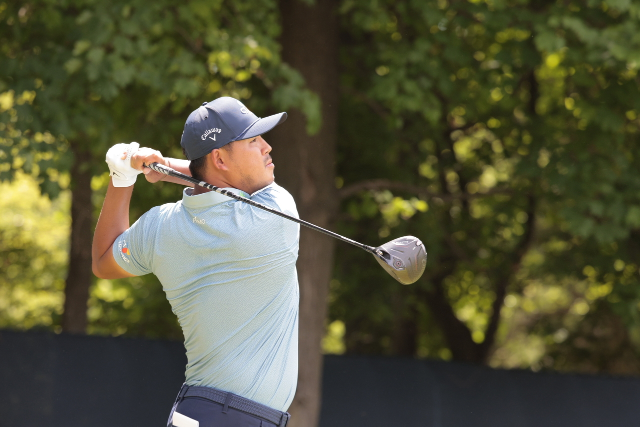 Kim Si-woo of South Korea tees off on the fourth hole during the final round of the PGA Championship at Aronimink Golf Club in Newtown Square, Pennsylvania, on Sunday. (EPA)