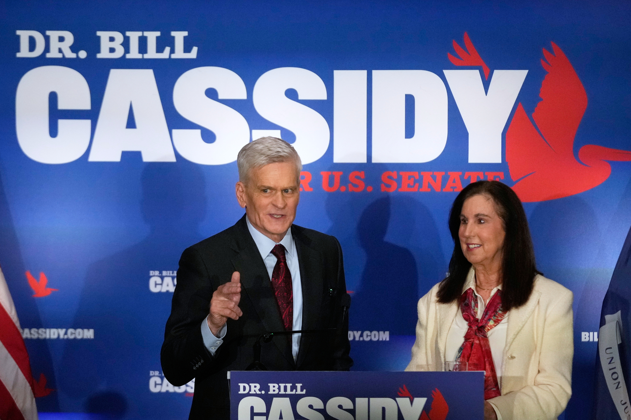 Bill Cassidy (left) speaks to supporters alongside his wife, Laura, during an election night watch party  in Baton Rouge, Louisiana, Saturday. (AP-Yonhap)