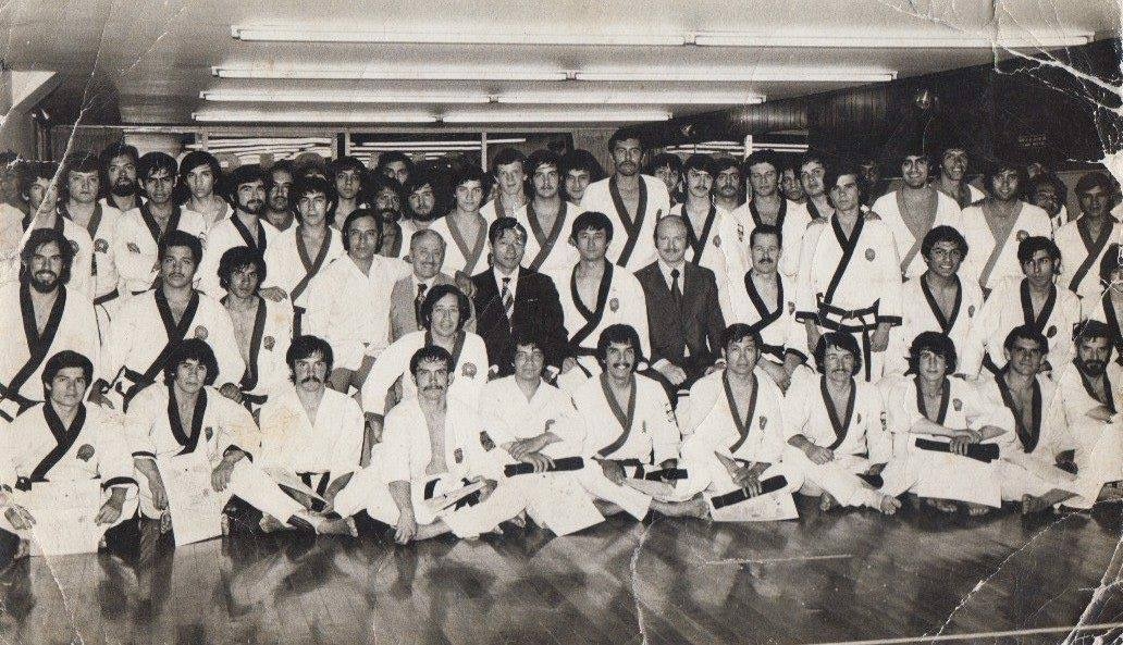 Moon (center) with students and associates at a dojang in an undated group photo believed to have been taken around 1975. (Moon Dai-won)