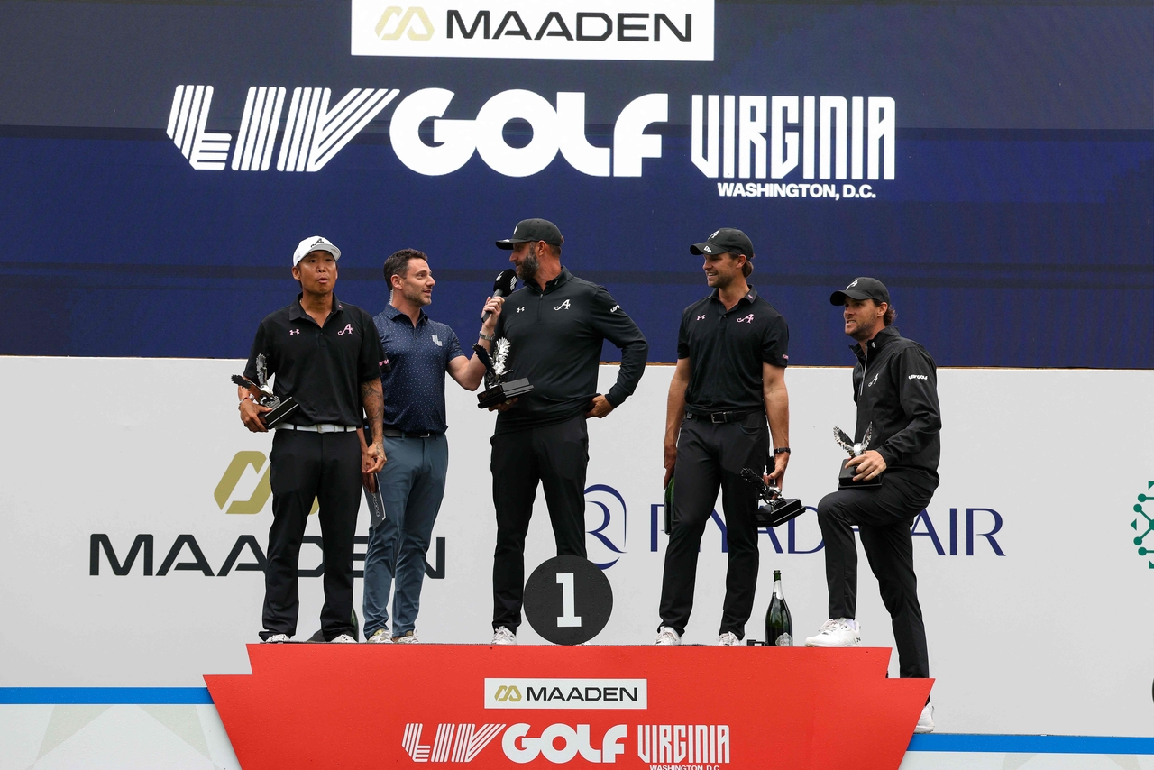 Anthony Kim (left), Dustin Johnson (third from left), Thomas Pieters (second from right) and Thomas Detry (right) of 4Aces GC during day four of LIV Golf Virginia at Trump National Golf Club, in Sterling, Virginia, May 10.    (AFP-Yonhap)