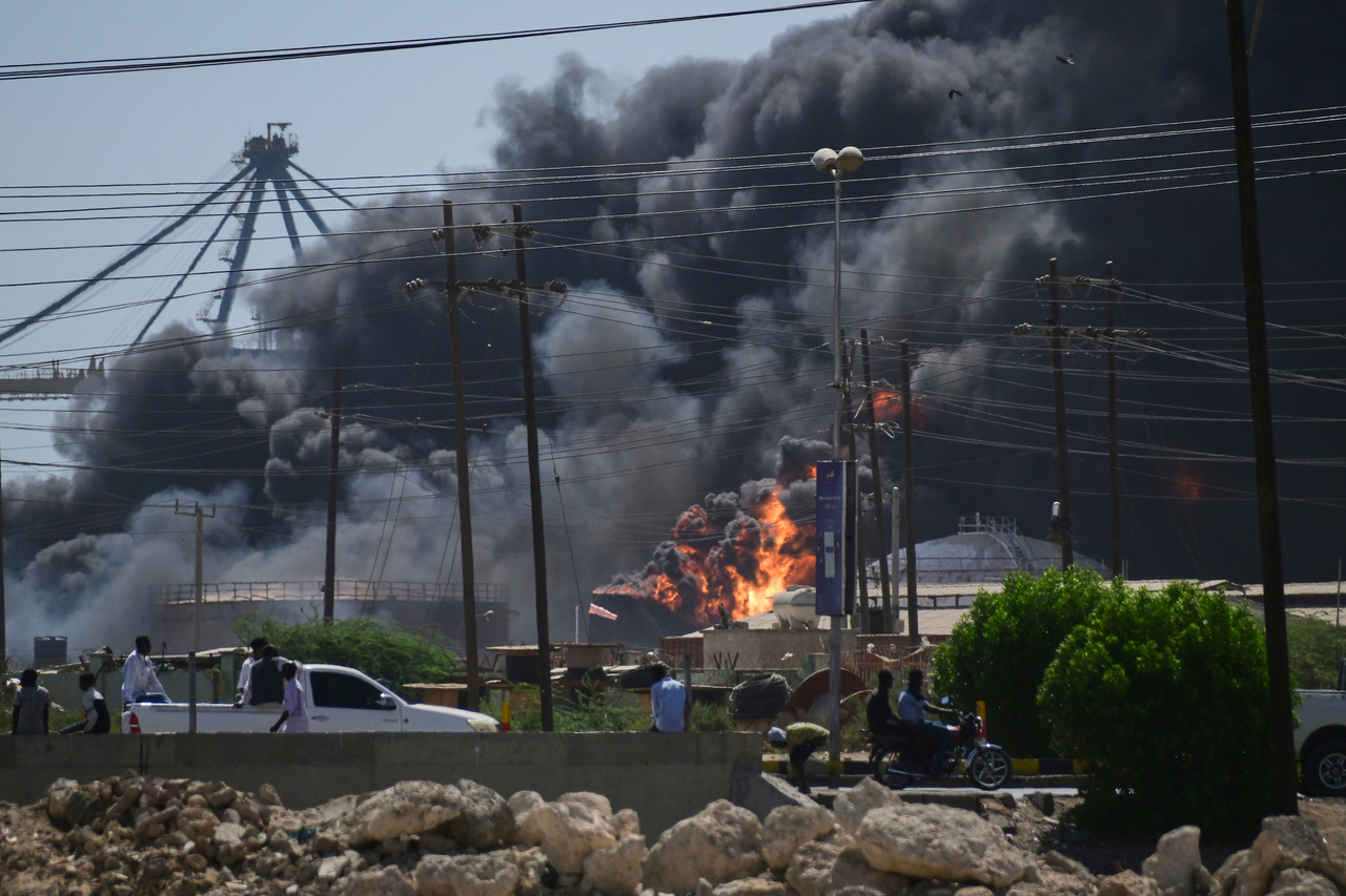 Smoke billows after strikes in the Red Sea city of Port Sudan, Sudan, in early May. (AP-Yonhap)