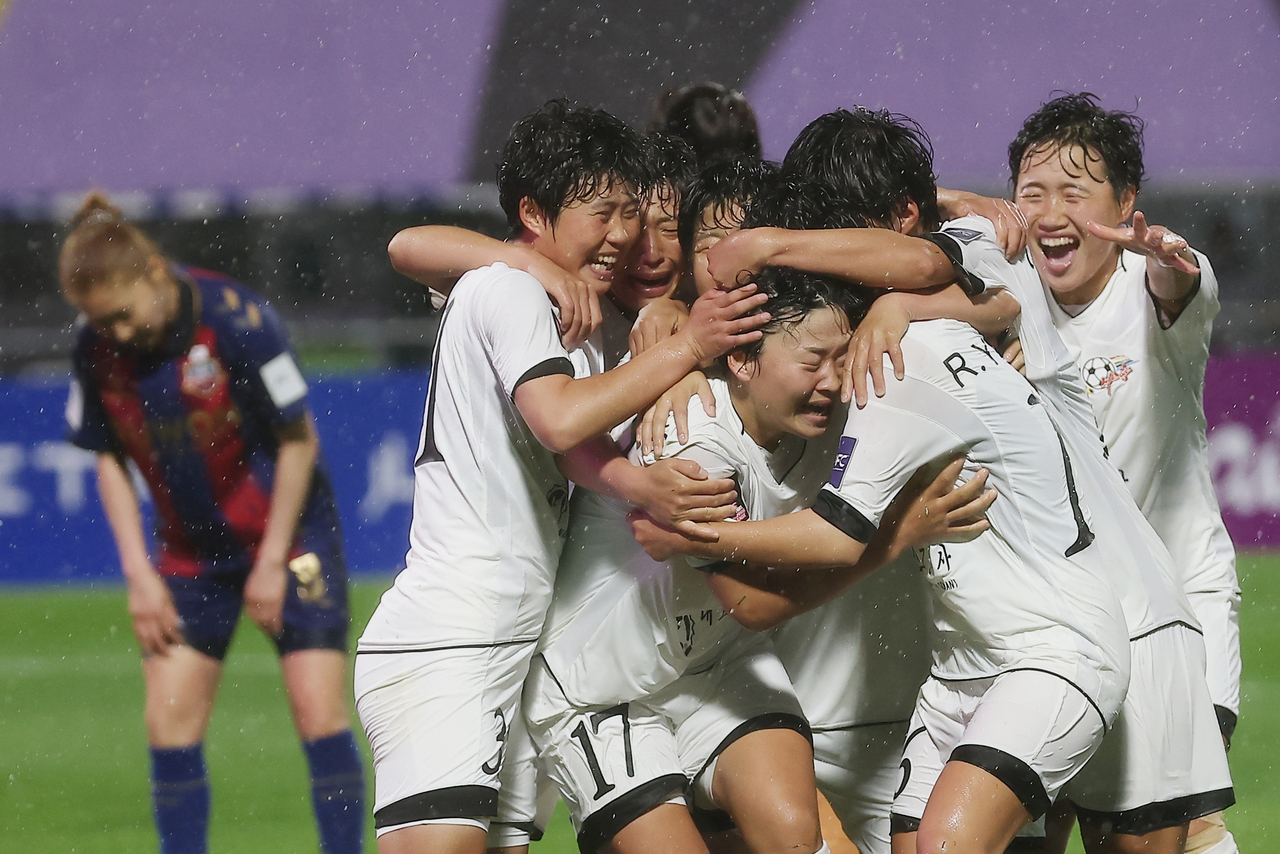 Naegohyang Women's FC players celebrate after Kim Kyong-yong scored a goal to take the 2-1 lead against Suwon FC Women in the semifinals match of the Asian Champions League on Wednesday, at the Suwon Stadium in Suwon, Gyeonggi Province. (Yonhap)