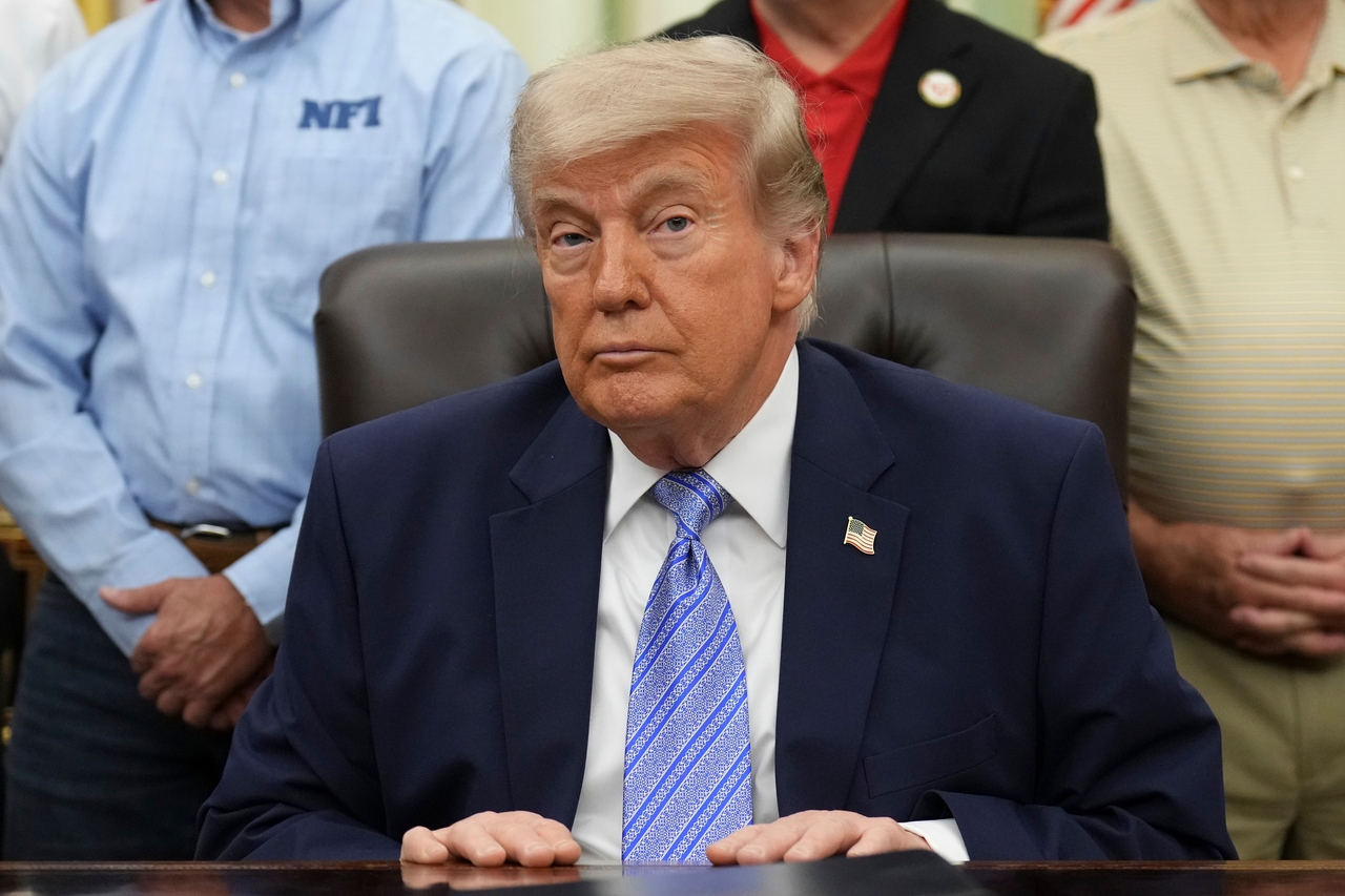 US President Donald Trump attends an event on loosening a federal refrigerant rule in the Oval Office at the White House in Washington on Thursday. (Associated Press via Yonhap)