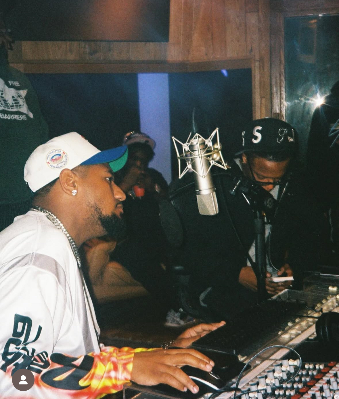 Derrick Milano works with WhoJiggi producer and Cash Cobain at a studio in this file photo taken in August 2025. (Derrick Milano)
