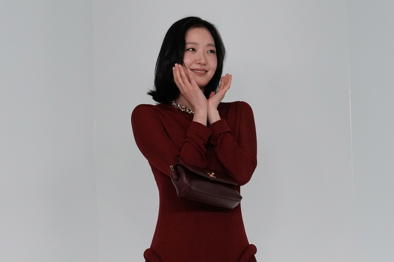 Kim Go-eun poses during a photocall before the presentation of the Chanel Metiers d'Art 2026 collection in Seoul on Tuesday. (Ahn Young-joon/AP Photo)