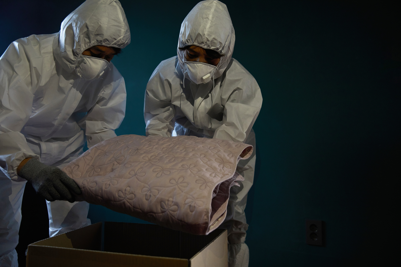 A stock image of special cleaners cleaning up a room where a lonely death occurred (Getty Images Bank)